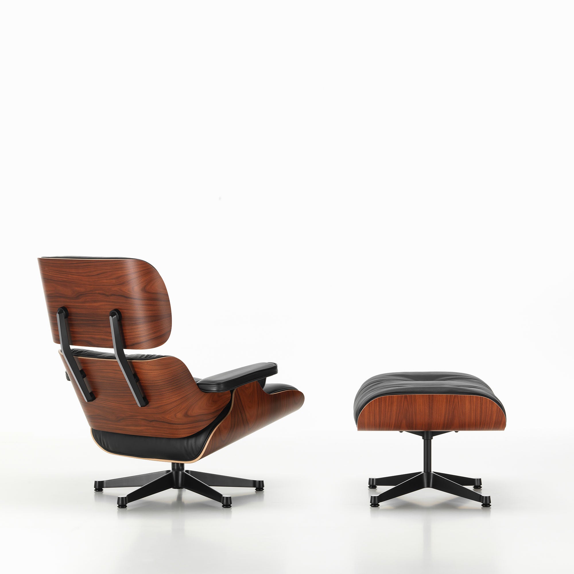 Eames Lounge Chair cu Otoman, lemn din palisandru și bază satinată cu laterale negre